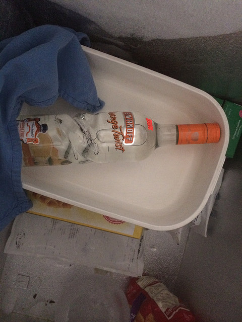 Freeze a glass bottle