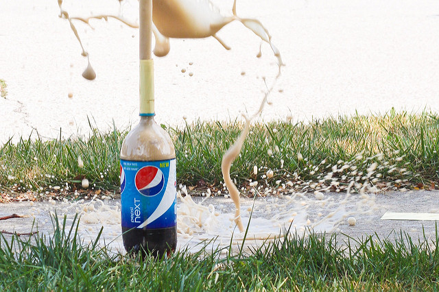 Diet Soda & Mentos Explosion via The Risky Kids